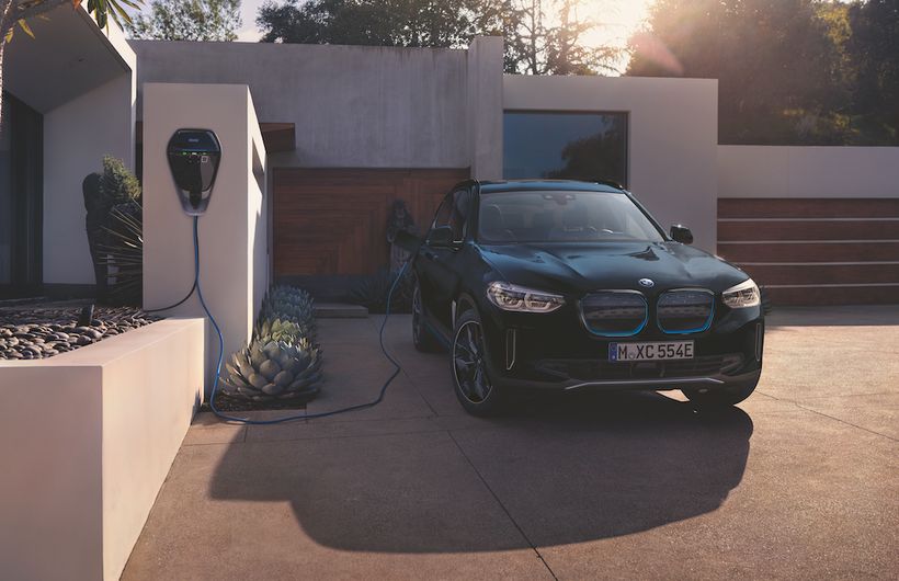 bmw ix 3 charging on driveway